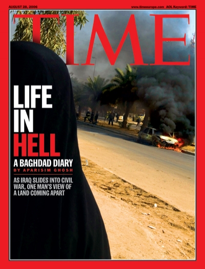 Photograph of an Iraqi woman at the scene of a car bomb.
