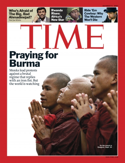 A photo of Burmese monks praying