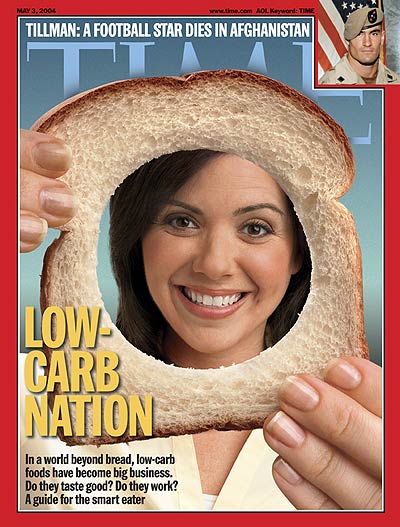 A photo of a woman looking through a hole in a piece of white bread.