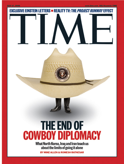 Cowboy hat, bearing Presidential Seal, with two small feet emerging.