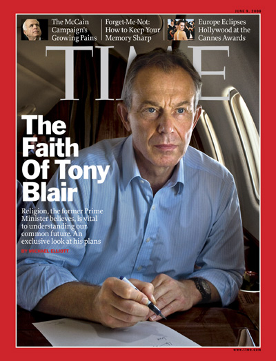 Photo of Tony Blair sitting on an airplane.