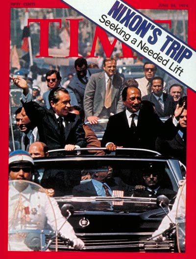 President Nixon in open car with Egyptian Pres. Sadat