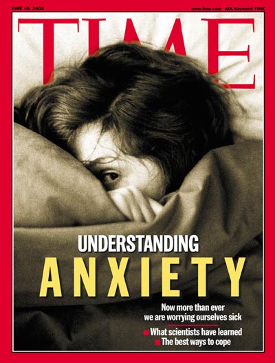 Anxiety depicted by cringing woman
