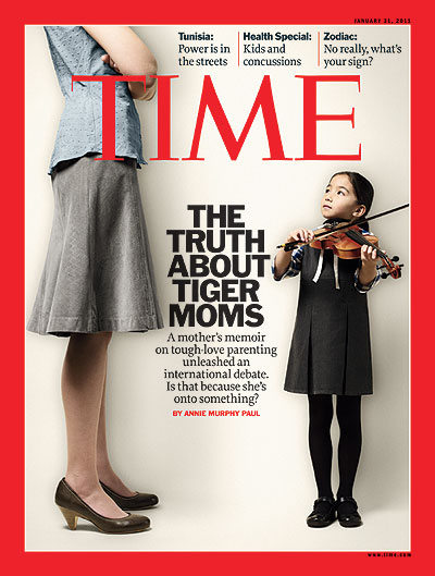 A woman oversees her daughter playing the violin