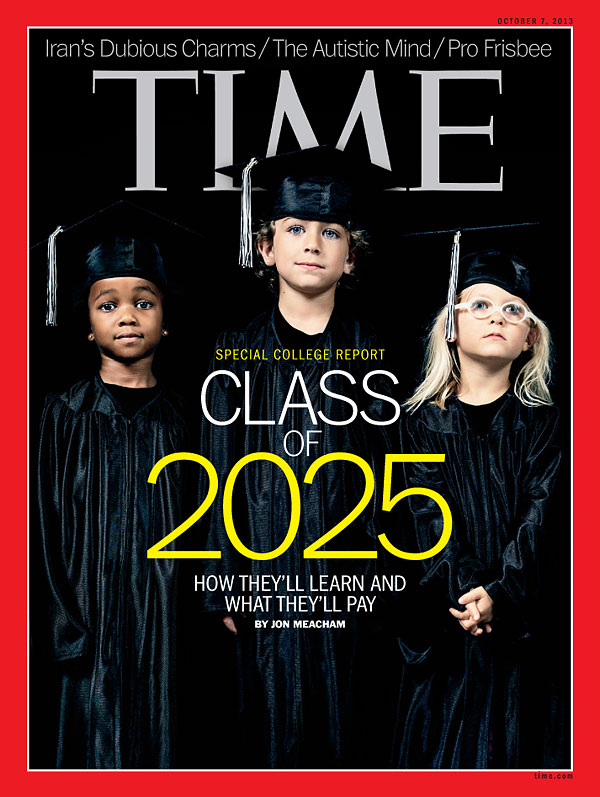 Three children standing in graduation outfits againt a black backdrop