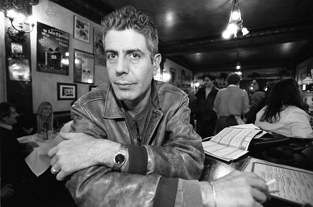 Bourdain, at his New York City location of Brasserie Les Halles. While he is best known as a chef, Bourdain has also written several books, including the brash, confessional memoir, <i>Kitchen Confidential</i> (2000), and two novels.  
