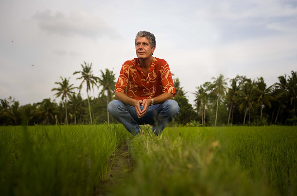 Of his approach to food and eating, Bourdain, in Bali, Indonesia, above, has said, 