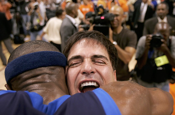 Jason Terry and Cuban celebrate after the Mavericks defeated the Phoenix Suns in game six of the Western Conference Finals during the 2006 NBA Playoffs. 
 
