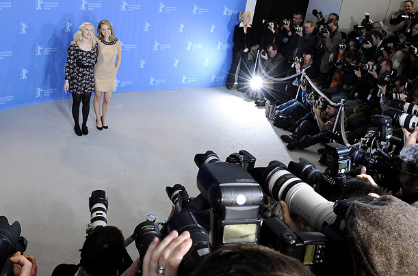 Portman and Scarlett Johansson pause for the media before a screening 