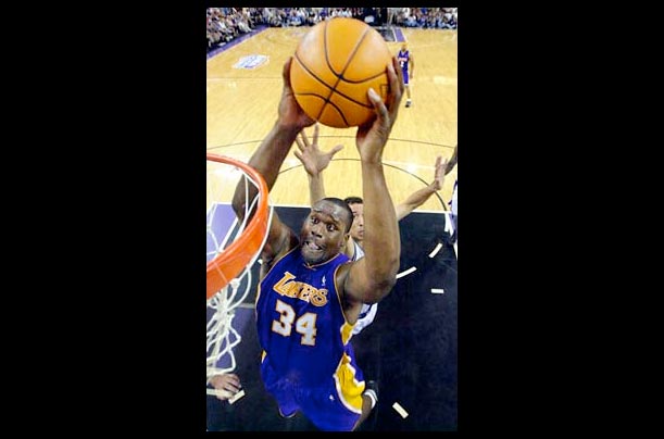 The Los Angeles Lakers' Shaquille O'Neal dunks the ball The Los Angeles Lakers' Shaquille O'Neal dunks the ball