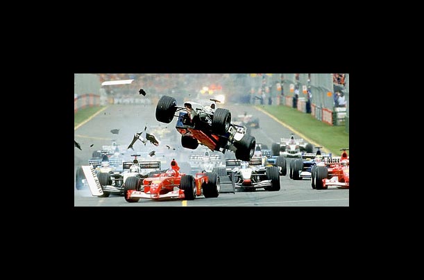 Williams driver Ralf Schumacher is launched in the air over Ferrari driver Rubens Barrichello of Brazil in a dramatic Australian F1 Grand Prix