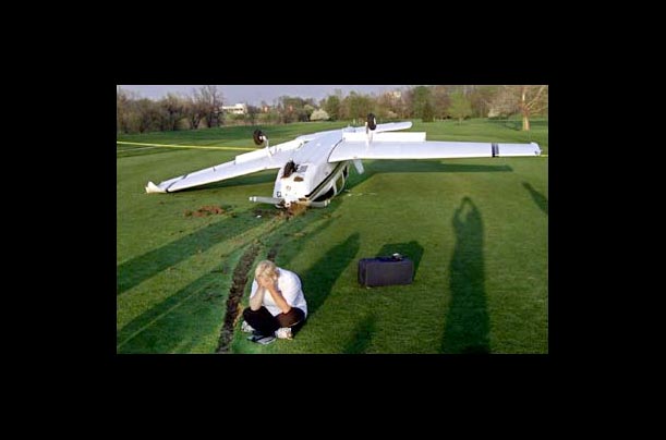 Carol Saunders reacts after making an emergency landing on the Lafayette Golf Course in Lafayette, Indiana