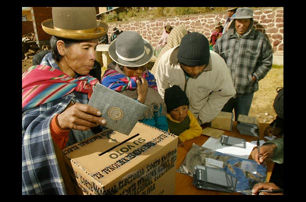An Aymara Indian casts her vote during a national referendum in Ajllata, Bolivia