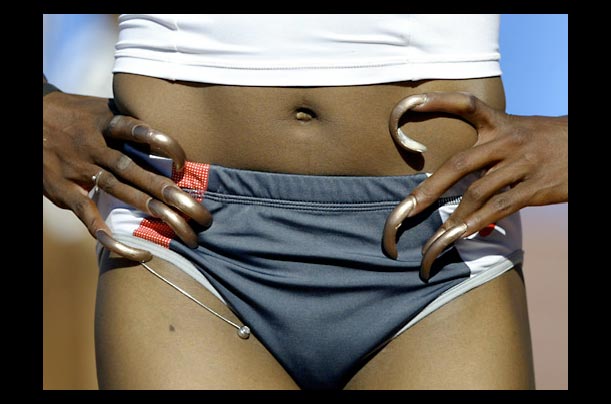 Gail Devers of the US waits in the finish area after the Women's 100 Meters Hurdles event at the US Olympic Track and Field Team Trials in Sacramento, California