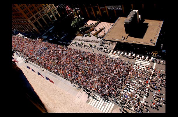 demonstrators march up a Manhattan street to protest the Bush Administration and the war in Iraq during the 2004 republican national convention