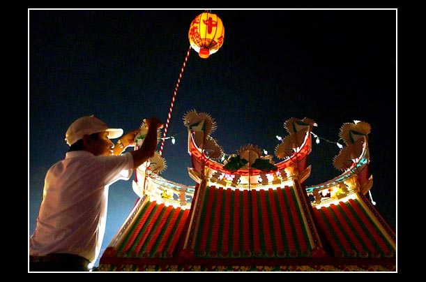 the souls of relatives guided by lantern during Chinese Ghost Month in Keelung, Taiwan