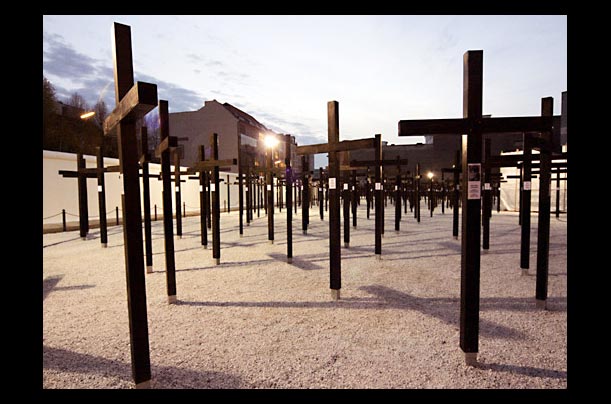 A collection of 1065 crosses represent people killed while trying to cross the Berlin Wall serve as a memorial