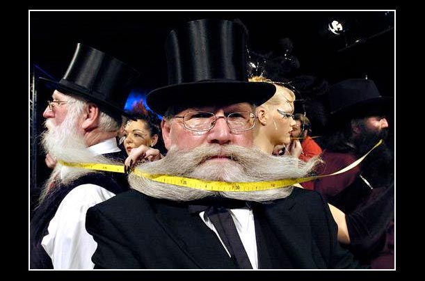 a mustached participant in the world's longest beard chain in the germany city of stuttgart