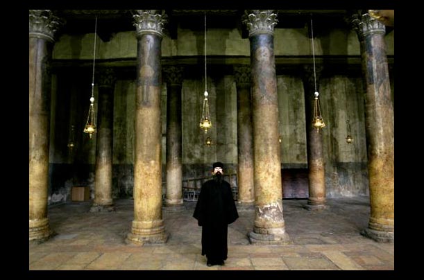 A Greek-Orthodox monk at the Church of the Nativity, which is believed to be the birthplace of Jesus, in Bethlehem