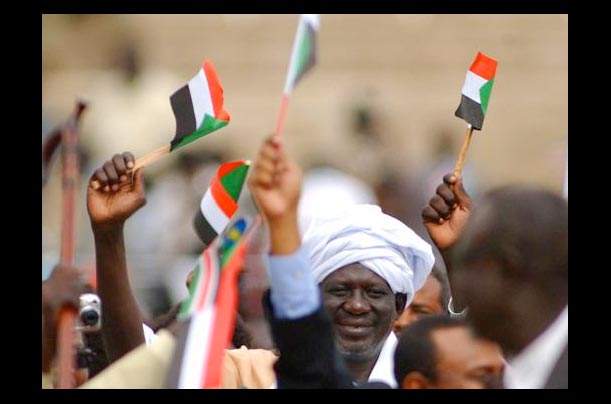Supporters of the Sudanese Peoples Liberation Movement celebrate the signing of Sudan Comprehensive Peace Agreement at Nyayo Stadium, Nairobi, Kenya