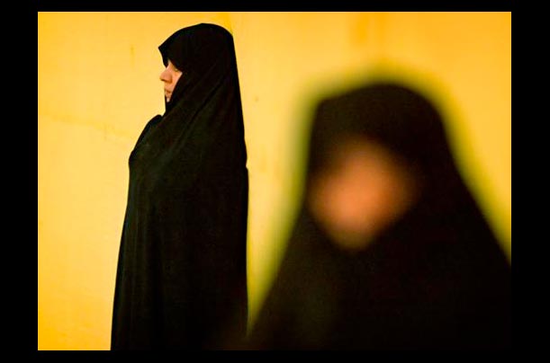members of the iranian basij militia attend the 26th anniversary ceremony of iran's islamic revolution