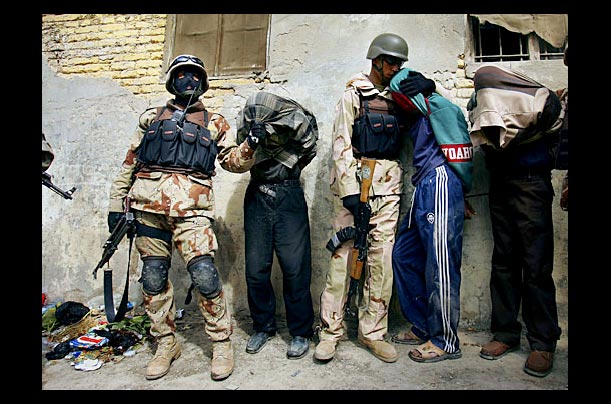 Iraqi soldiers detain suspects during a patrol with U.S. Army 1st Cavalry in the Haifa Street neighborhood of Baghdad Iraqi soldiers detain suspects during a patrol with U.S. Army 1st Cavalry in the Haifa Street neighborhood of Baghdad