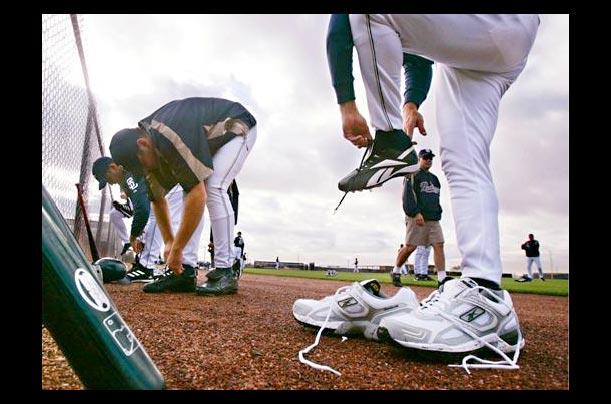 San Diego Padres players prepare for the first day of spring training in Peoria, Arizona