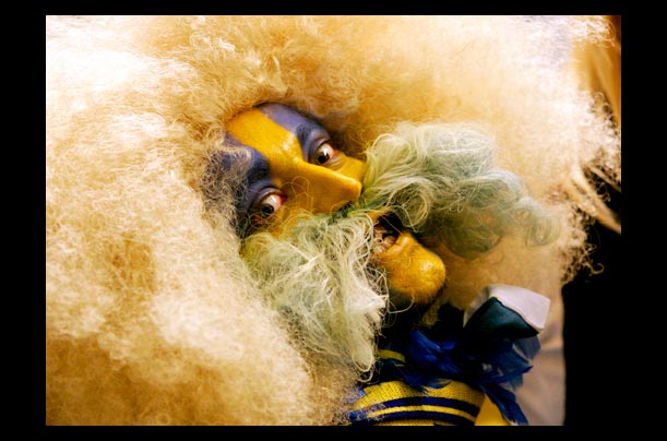 A Swedish fan sports a wig and mustache during the semifinals hockey match against the Czech Republic at the Ice Hockey World Championships in Vienna