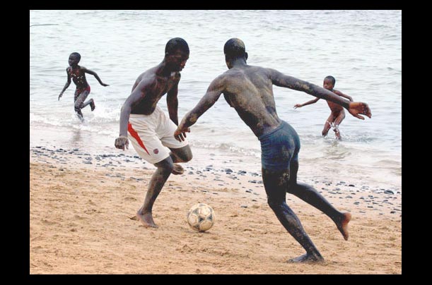 Senegalese men play football in Dakar. The African Union celebrated Africa Day on May 25, marking the anniversary of the Organization of African Unity