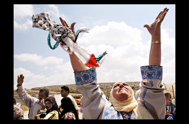 near ramallah, palestinians celebrate after being released from jail