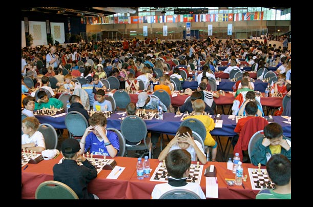 Young players contemplate their boards during the World Youth Chess Championship in Belfort, France