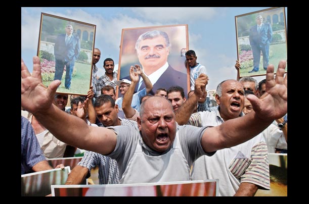 a lebanese man reacts after three former security chiefs were detained by u.n. investigators after the february 14 assassination of former prime minister rafik hariri