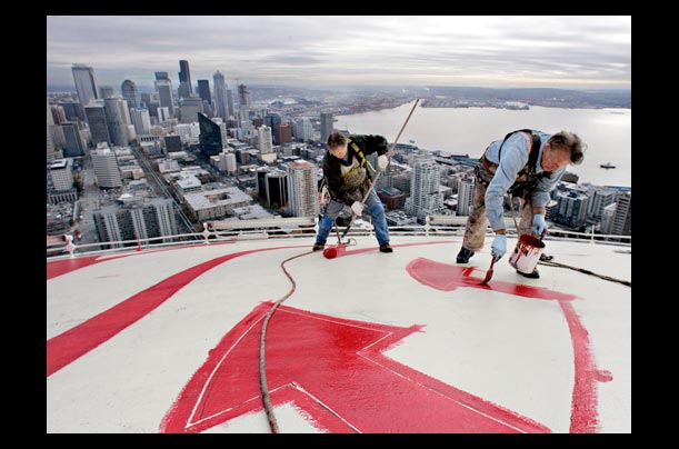A crimson-colored Washington State University logo is painted on top of Seattle's Space Needle, after WSU won a Tackling Hurricane Relief contest, raising more money for Habitat for Humanitythan rival University of Washington