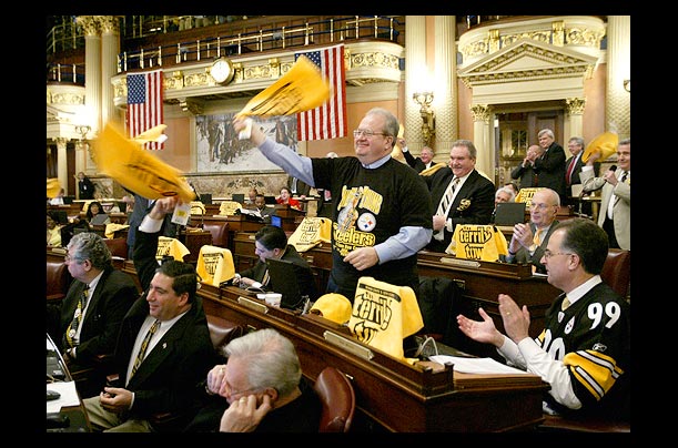 Members of the Pennsylvania House of Representatives in Harrisburg wave terrible towels congratulating the Pittsburgh Steelers for making it to the Super Bowl