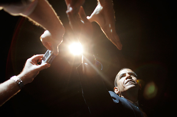 Democratic presidential candidate, Senator Barack Obama shakes hands with supporters after delivering a speech at the Miami Dade County Auditorium, August 25, 2007 in Miami, Florida.