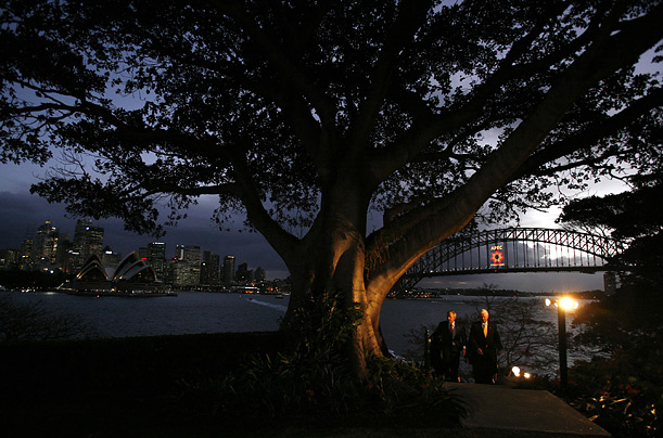 President Bush and Australia's Governor-General Michael Jeffery stroll the grounds of Admiralty House in Sydney prior to the beginning of the Asia-Pacific Economic Cooperation summit. President Bush and Australia's Governor-General Michael Jeffery stroll the grounds of Admiralty House in Sydney prior to the beginning of the Asia-Pacific Economic Cooperation summit.