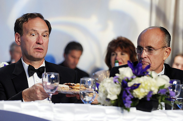 Supreme Court Justice Samuel Alito reacts as Republican presidential candidate Rudy Giuliani passes him a plate of cookies at a National Italian American Foundation gala dinner in Washington. Supreme Court Justice Samuel Alito reacts as Republican presidential candidate Rudy Giuliani passes him a plate of cookies at a National Italian American Foundation gala dinner in Washington.