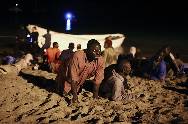 Would-be immigrants arrive at Las Vistas beach on Tenerife in the Canary Islands. Ninety-two Africans were intercepted aboard two fishing boats.