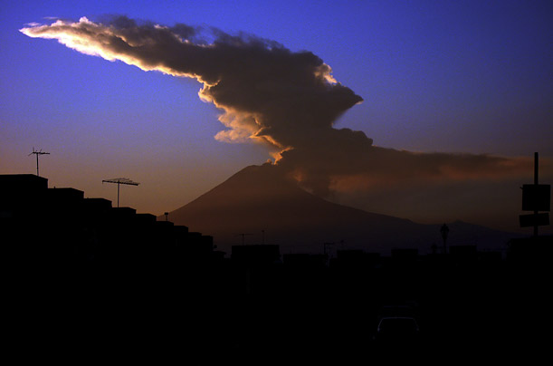 The Popocatepetl volcano, near Puebla, Mexico, sends out a plume of smoke and steam. The volcano has been intermittently erupting since December 1994.
