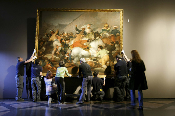 Employees of the Prado Museum in Madrid return Goya's 