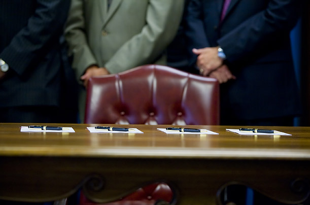 Pens wait for Governor Arnold Schwarzenegger to sign AB 1252, a bill designed to jumpstart California's economy.