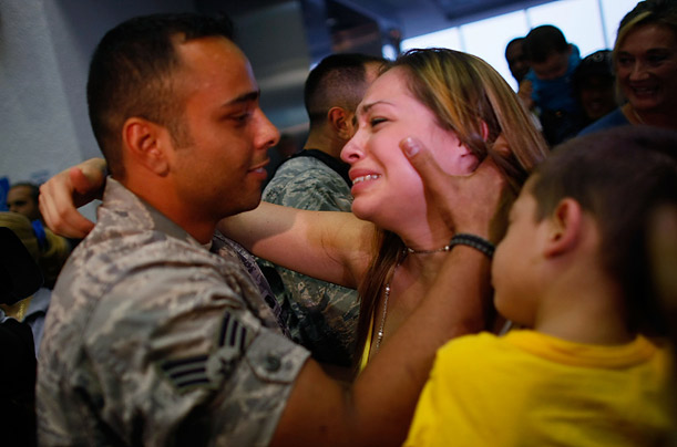 U.S. Air Force Senior Airman Francisco Diaz greets his fianc[a {e}]e Jacqueline Vazquez as he arrives home in Miami after a six-month deployment in Iraq.