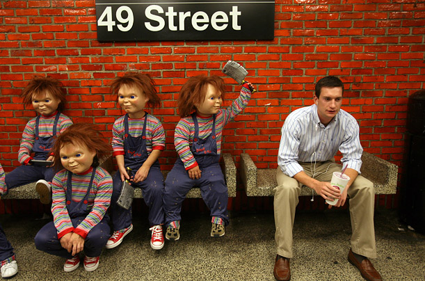 Actors costumed as the horror icon Chucky promote the 20th anniversary of the movie [ITALIC 