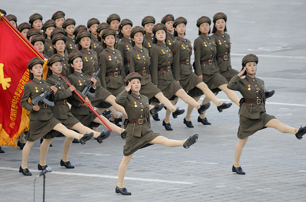 North Korean soldiers goose step through Kim Il Sung Square in Pyongyang, in celebration of North Korea's 60th anniversary.