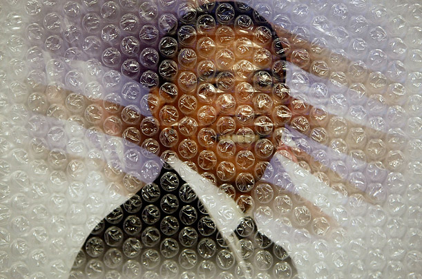 Bubble wrap protects a framed photograph of President-elect Barack Obama for sale at Political Americana's inaugural store near the White House.

