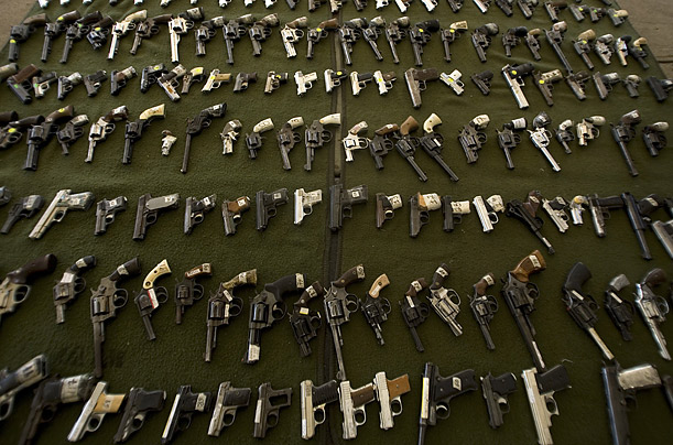 Guns are displayed by the Mexican Army before being destroyed as part of a campaign to remove weapons from the streets of Baja, California