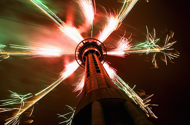The annual New Year's Eve midnight fireworks display is seen from below the Sky Tower as New Year is welcomed in Auckland, New Zealand