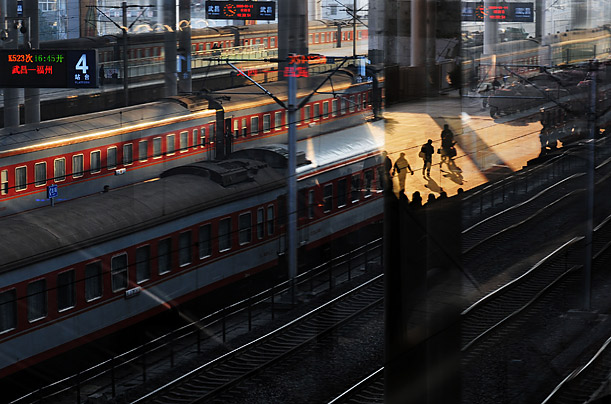 Passengers board trains at the Wuchang Railway Station in Wuhan, China.