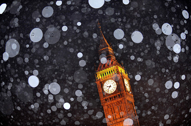 Snow falls in Parliament Square, London, as a heavy snowstorm hit parts of Britain.

