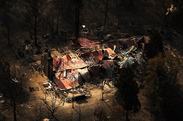 The burned out remains of a house damaged by wildfires stands in the Kinglake region of Australia.


